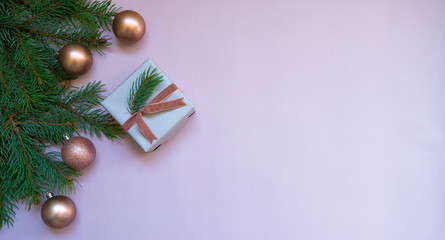 Christmas or new year frame composition. Christmas decorations in pink colors on pastel background with empty copy space for text. holiday and celebration concept for postcard or invitation. Top view.