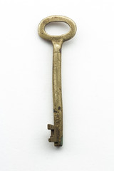 Antique vintage key on white background