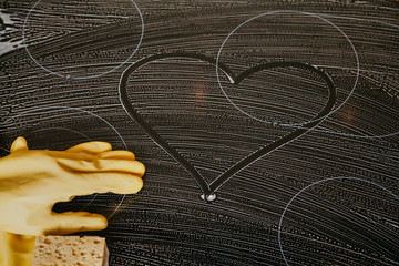 Cute heart painted on whitish surface