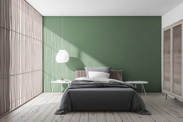 Stylish green and white bedroom interior