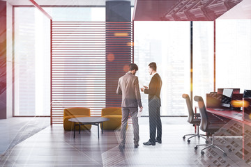 Business people in panoramic office with lounge