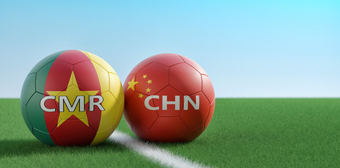 China vs. Cameroon Soccer Match - Soccer balls in China and Cameroon national colors on a soccer field. Copy space on the right side - 3D Rendering 
