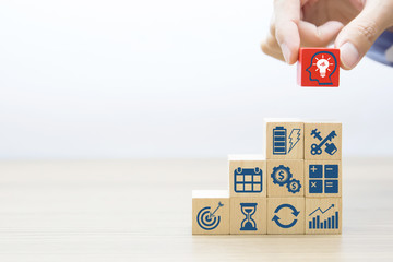 Business and Teamwork concept in Wooden Block.