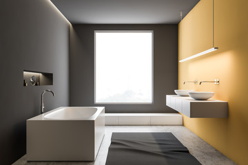 Fototapeta na wymiar Gray and yellow bathroom interior