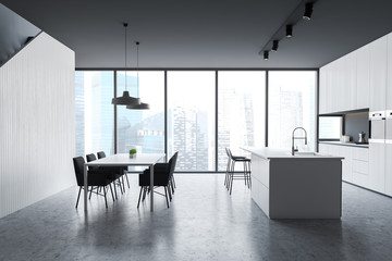 Gray panoramic kitchen interior with table