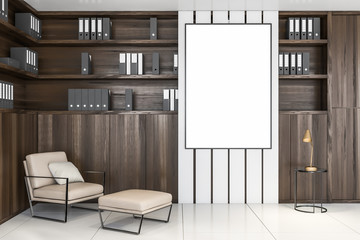 Wooden office lounge area, armchair and poster