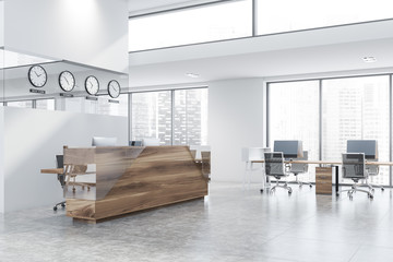 Wooden reception counter in white office corner