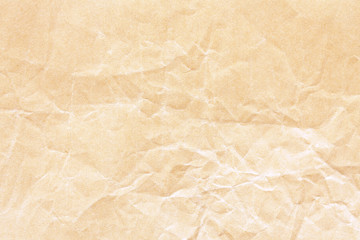 Old brown crumpled Kraft paper background texture