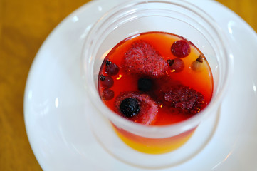 Strawberry Jelly in a cup on the wood table