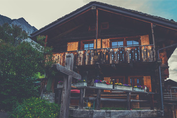 Fototapeta na wymiar Switzerland. Swiss alps. Old wooden houses. Beautiful alpine landscape, old Swiss traditional wooden hut.