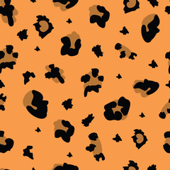 Brown leopard print with spots, seamless pattern, background and texture for fabric.