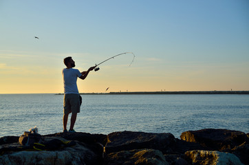 fishing at sunrise