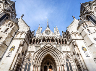 Facade of Royal Courts of Justice on Stand, London, UK