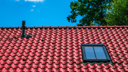 Dutch orange roof with a window