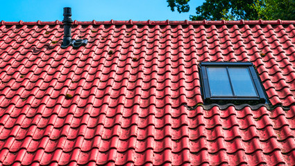 Dutch orange roof with a window