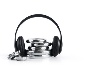 Chromium plate dumbbell with Wireless headphone isolated on white background, Fitness equipment