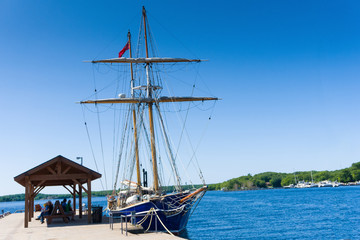 Fototapeta na wymiar Moored Brig with folded sails