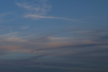 jet in the sky,cloudscape,view,evening,sunset,wind,travel,