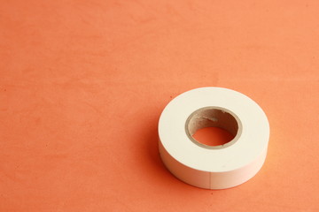 roll of white plastic insulating tape