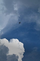 airplane in the sky,jet,cloudscape,travel,blue,aviation,white