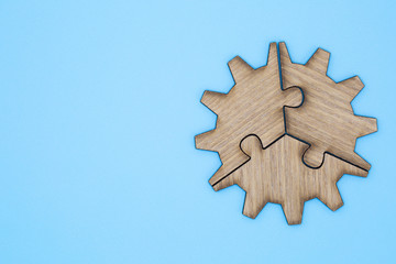  Wooden jigsaw puzzle on a blue background