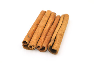 Cinnamon stick on isolated white background