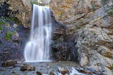 View of waterfall near Layton, Utah at the beginning of summer