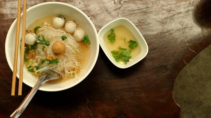 views,  Noodle Soup on the wooden table background
