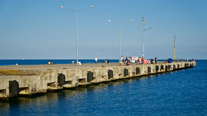 Sinop harbor, pier and strollers