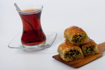 Tea and baklawa with white background