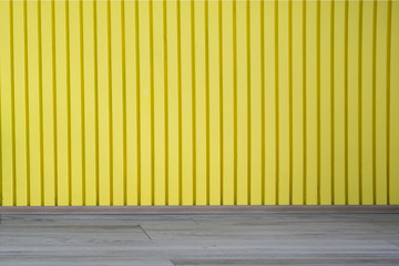 Empty yellow vertical plank wood background and wood floor.Blank space.