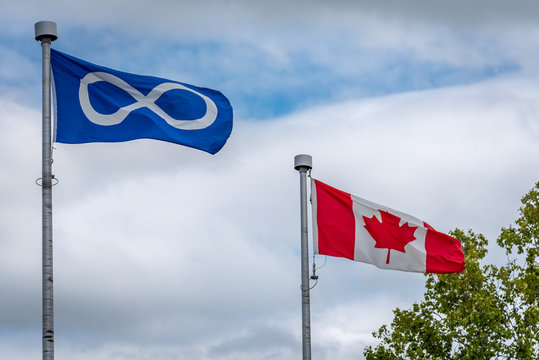 Metis and Canadian Flag outside. 
