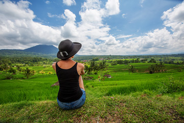 woman looking at rice terrace in Bali, Indonesia