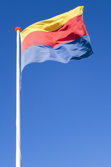 Fototapeta na wymiar flag of Dutch province North Holland flying in the wind