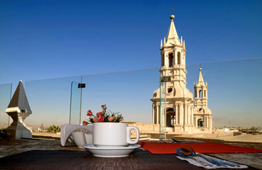 Morning Coffee at the Rooftop Terrace with Gorgeous Bell Tower of Basilica Cathedral of Arequipa in...