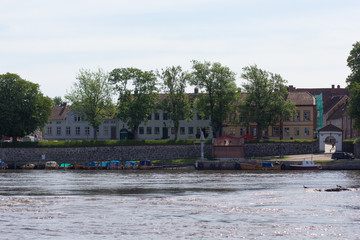 View on old town water Mill on the river Glomma in Fredrikstad city Norway
