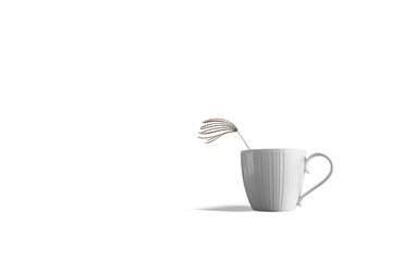 fluffy grass in cup of coffee