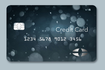 A freeze on your credit report is illustrated with snow and ice decorating a mock generic credit card.
