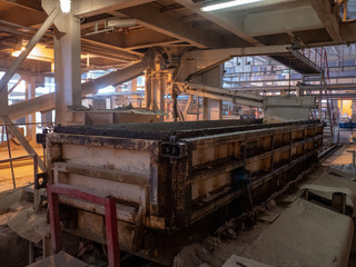 Plant for production of aerated concrete building blocks according to German technology..Equipment supplied by German company. Pipe, mixing drums, drying chambers, conveyors for moving