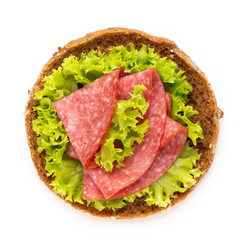 Sandwich with salami sausage on white background.