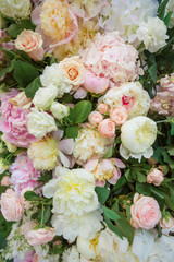 Wedding arch for ceremony outdoor with flower decoration and rustic design