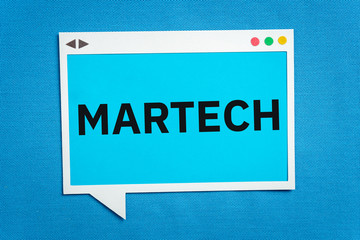 MARTECH written on a speech bubble on blue background. Martech is the blending of marketing and technology.