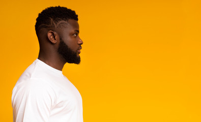 Profile portrait of serious african american man