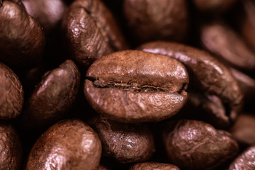 Roast coffee beans macro shot and texture details.