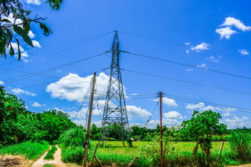 electricity pylons in field