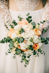 Rustic wedding photo zone. Hand made wedding decorations includes Photo Booth, wooden barrels and boxes, lanterns, suitcases and white flowers