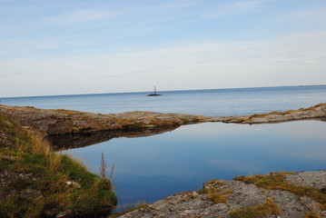 Sea with small lake in front