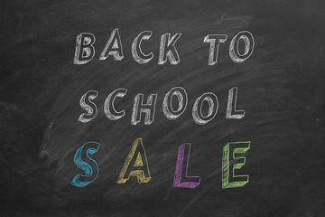 Fototapeta premium Back to School SALE. Text on blackboard.