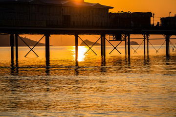 wooden pier at sunset