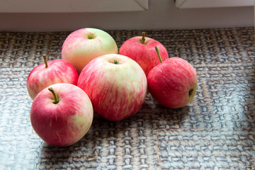Ripe apples on the window,autumn harvest,useful vitamins